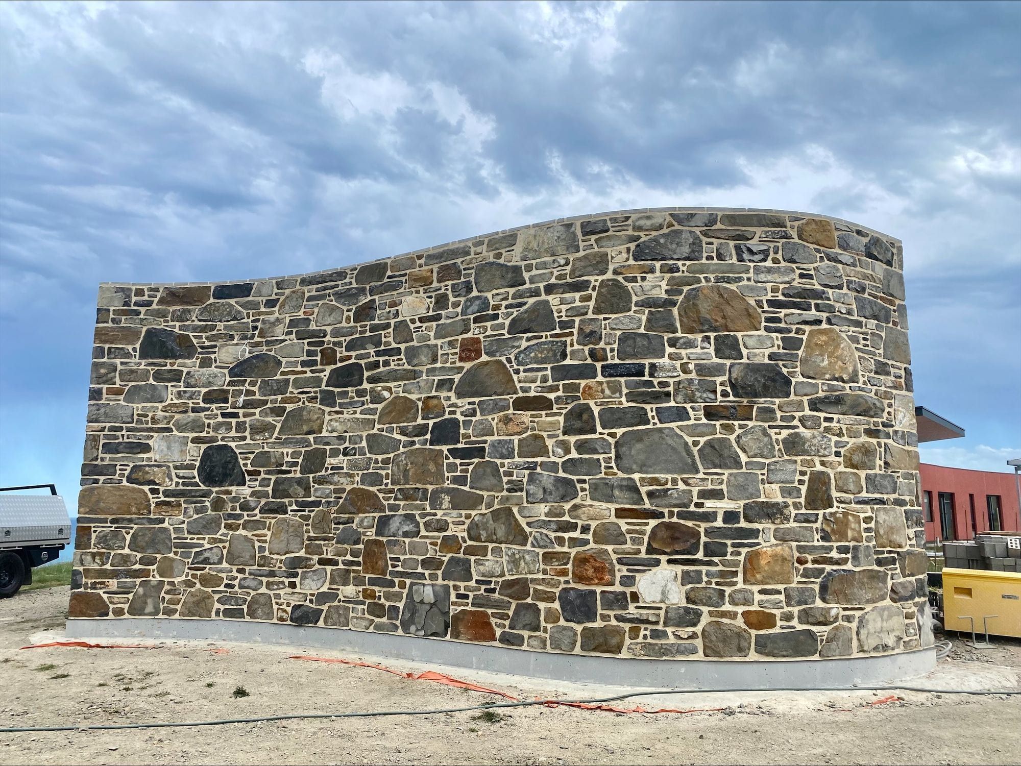 Curved architectural stone wall