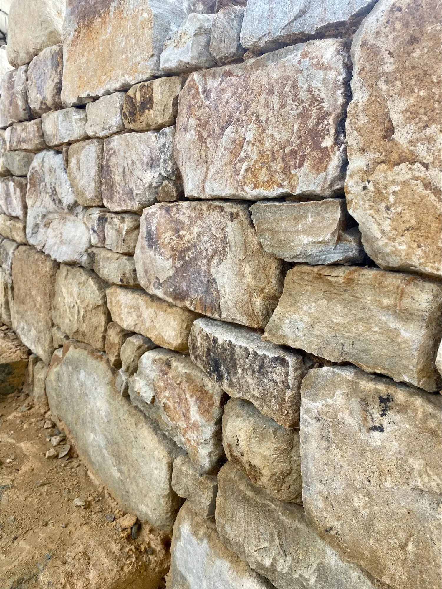 Close-up of a hand-laid dry stone wall